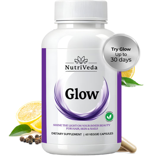 Nutriveda Glow dietary supplement bottle with lemon slices and green leaves on a white background
